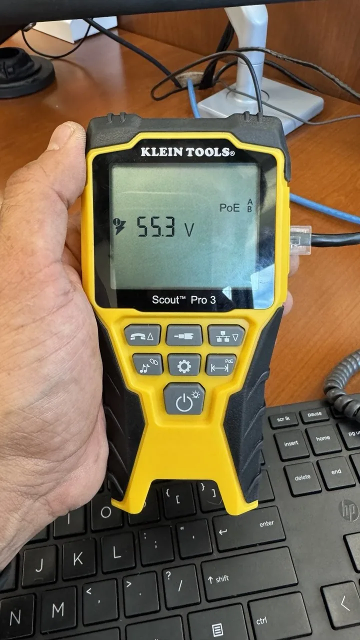 Same tester reading 55.3 volts after replacing the connector